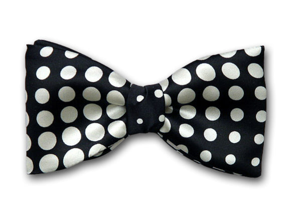 Formal black and white bow tie. White dots on black.
