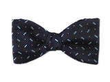 Navy blue bow tie. Small blue patterns on navy.