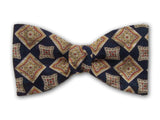 Gold square on navy. Fine silk bow tie for men.