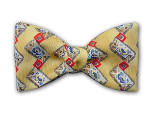 Red square on yellow. Silk bow tie for men.