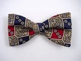 Grey small flower in red and navy squares. Men's silk bow tie.