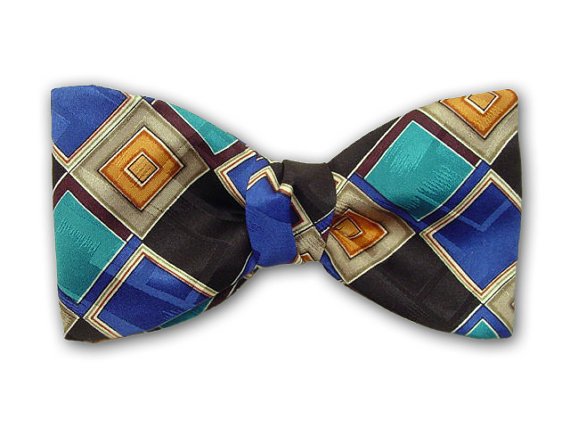 Plaid silk men's bowtie. Teal, royal blue, black, ochre, pale green and white squares.