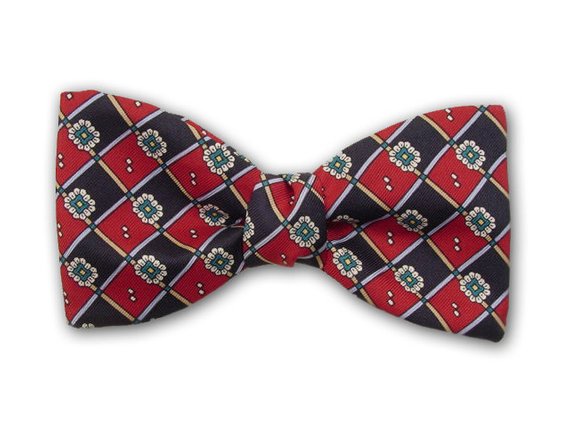 Silk men's bow tie. Green flowers and navy and red squares. 