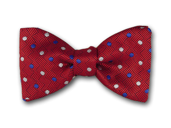 White and blue dots on red. Woven silk polka dot bowtie.