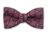 Burgundy small figure on navy. Patterned men's bow tie.
