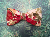 Bow tie on Christmas tree. Red and green color.