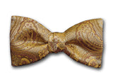 Gold paisley bow tie in different styles and widths made of woven silk.